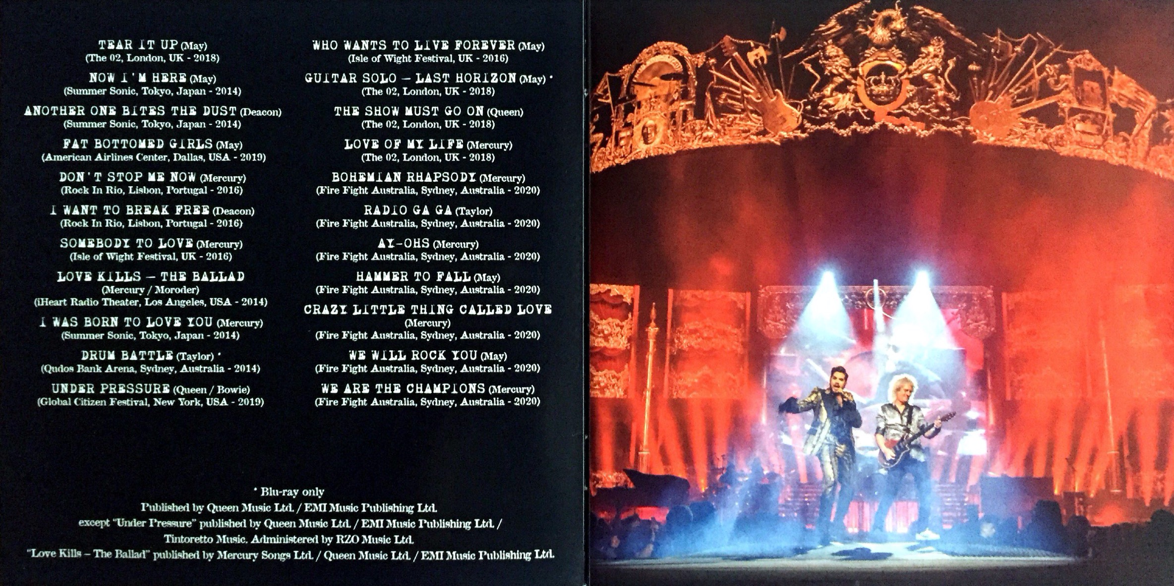 2-page spread from the Live Around The World album booklet by Queen and Adam Lambert. The left page shows the track listing, while the right page shows a photo of the band performing ons stage, spotlights shining down on all 3 members. High above them, a large and very ornate golden archway spans the stage, with the Queen crest in the centre.