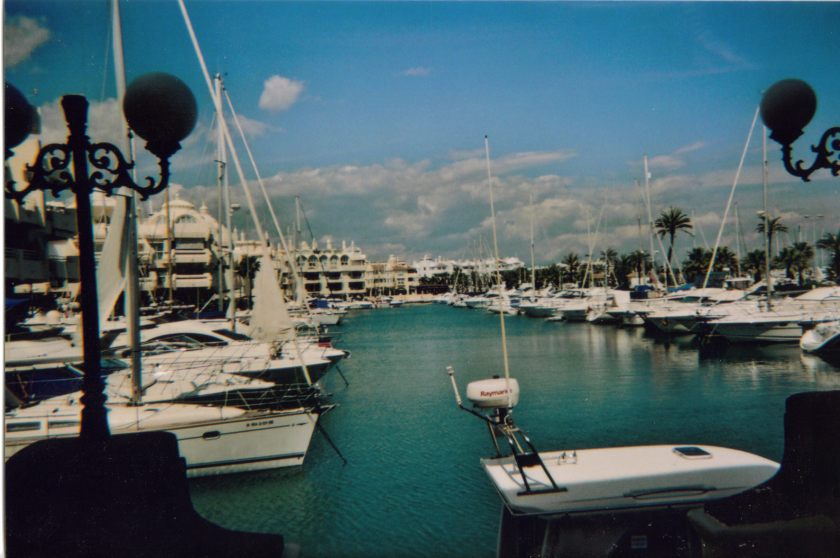 Benalmadena Marina, a long and wide expanse of water with boats along each side.