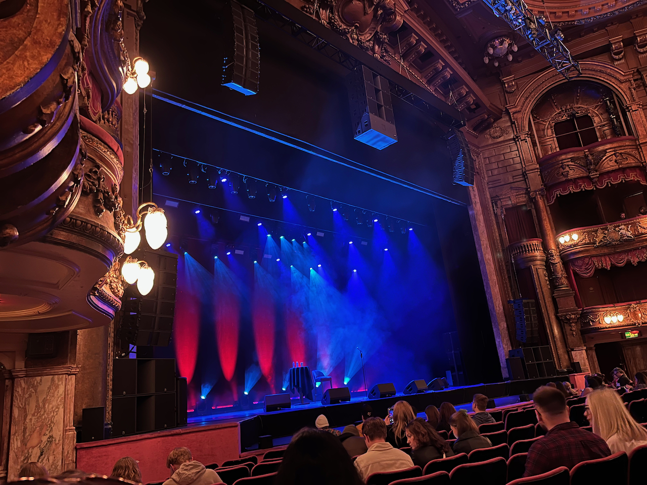 The stage in the London Palladium, with blue lighting.